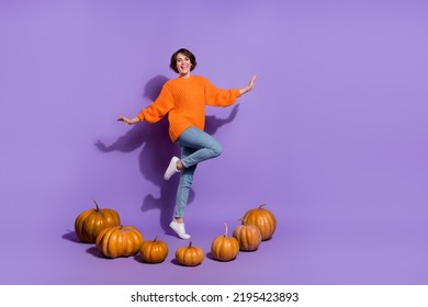 Full Length Body Size View Of Attractive Crazy Girl Dancing Among Pumpkins Having Fun Isolated On Bright Purple Violet Color Background