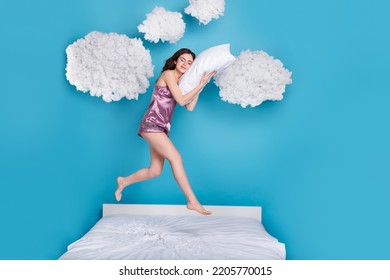 Full length body size view of attractive trendy calm girl jumping relax sleeping isolated over bright blue color background - Shutterstock ID 2205770015