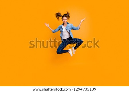 Full length body size view of nice attractive lovely graceful slim sporty sportive fit cheerful cheery school girl fooling having fun isolated over bright vivid shine yellow background
