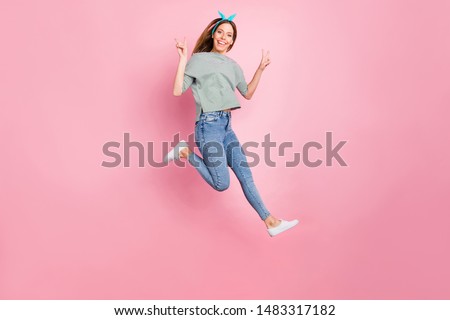 Full length body size view of her she nice attractive lovely charming cute pretty winsome cheerful cheery girlish straight-haired girl having fun showing v-sign fooling isolated over pink background