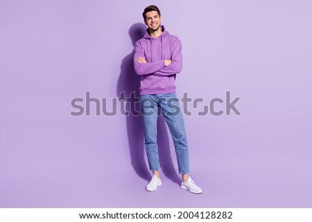 Full length body size view of attractive content cheerful guy folded arms posing isolated over purple violet color background