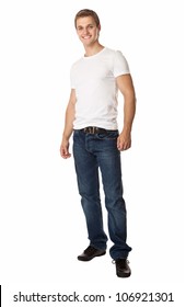 Full Length Of A Cute Young Man In Jeans And T-shirt Looking At The Camera, Against White Background