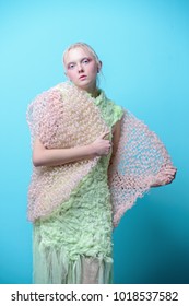Full length fashion portrait of a female model performing designer collection. Avant-garde style. Studio shot. - Shutterstock ID 1018537582