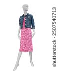 Full length female mannequin dressed in pink dress with flower pattern and jeans jacket isolated on white background with clipping path. Sale and advertising theme