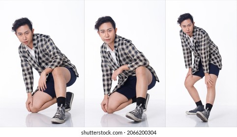 Full length Figure snap of 20s Asian Tanned skin man black hair shirt, pants, blazzer, sneaker shoes, isolated. Handsome male sit on floor poses many angle and smile happy over white Background studio