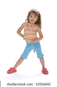 Full length, front view of 5 year old girl standing on white background wearing colorful clothes.