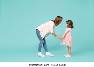 Full Length Happy Woman In Pink Clothes Have Fun With Cute Child Baby Girl 5-6 Years Old. Mommy Little Kid Daughter Dancing Isolated On Pastel Blue Background Studio. Mother's Day Love Family Concept