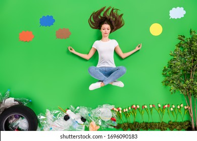 Full Length High Angle Flat Lay Photo Focused Lady Balancing Yoga Dream Nature Planet Saving Plastic Products Trash On Street Anti Pollution Community Owner Isolated Green Color Background