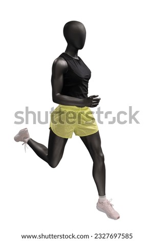 Full length image of a running female display mannequin wearing sportswear isolated on a white background