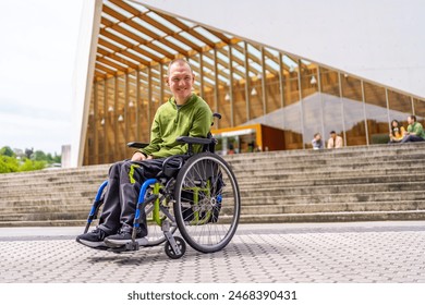 Full length low angle view portrait of a happy caucasian adult man with cerebral palsy smiling proud outside the university