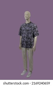 Full Length Male Mannequin Wearing Casual Summer Clothes Isolated On Purple Background.