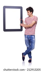 Full length man holding empty frame - copy space for text, over white background - Shutterstock ID 212913205