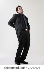 full length of Man Suffering Back Pain