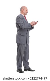 Full Length Mature Man Talking On Cell Phone Smiling At Camera