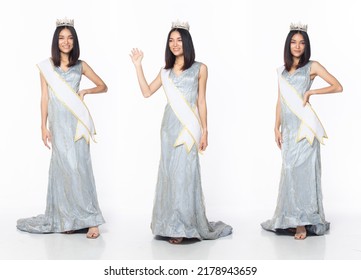 Full length of Miss Beauty Pageant Contest wear blue gray evening sequin gown with diamond crown sash, Asian female stand express feeling happy smile over white background isolated
