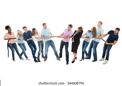 Full Length Of Multiethnic Creative Business Teams Playing Tug Of War Against White Background