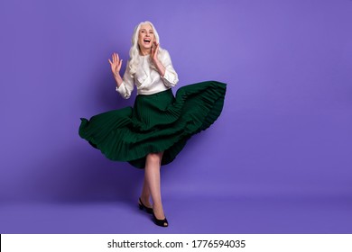 Full Length Photo Candid Charming Old Woman Enjoy Her Rest Relax Skirt Fly Wind She Laugh Feel Rejoice Wear Good Look Clothes Footwear Kitten Heels Isolated Vibrant Color Background