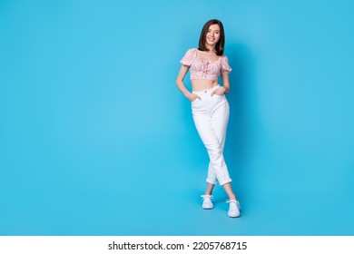 Full Length Photo Of Cheery Sweet Lady Hand Arm Pocket Leg Crossed Fashionable Outfit Stand Empty Space Isolated On Yellow Color Background