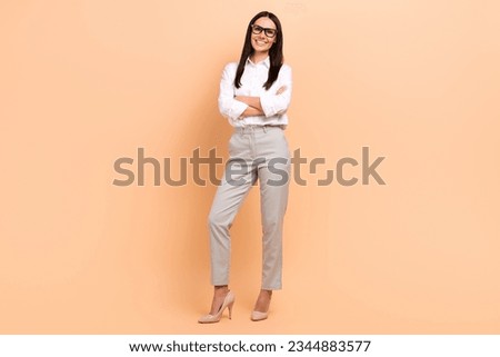 Full length photo of confident business woman crossed hands model posing office monthly best employer isolated on beige color background