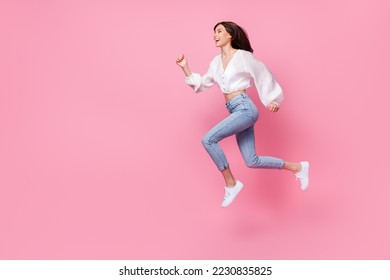 Full length photo of cool pretty lady wear stylish comfort clothes want buy new collection empty space isolated on pink color background - Shutterstock ID 2230835825