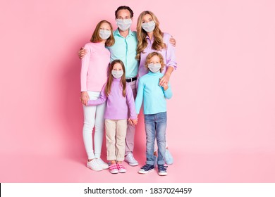 Full Length Photo Dream Family Parents Three Kids Hug Embrace Wear Medical Mask Casual Outfit Isolated Pastel Color Background