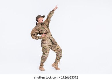 Full length photo of excited cheerful person look pointing finger empty space enjoy disco isolated on white color background