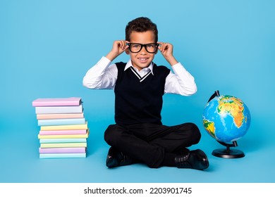 Full Length Photo Of Funny Sweet Little Guy Dressed Black Vest Arms Spectacles Reading Book Isolated Blue Color Background