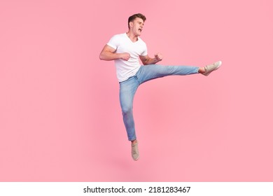 Full Length Photo Of Handsome Guy Jump High Up Dance Strange Dab Moves Isolated Pastel Color Background.