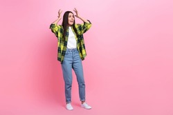 Full Length Photo Of Impressed Scared Lady Wear Checkered Jacket Rising Arms Hand Looking Empty Space Isolated Pink Color Background