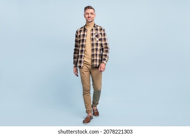 Full length photo of mature man good mood walk wear casual clothes isolated over grey color background - Powered by Shutterstock