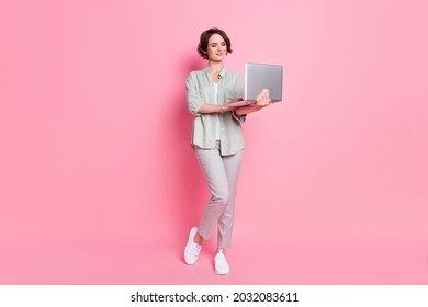 Full Length Photo Of Smart Bob Hairdo Lady Stand Write Laptop Wear Grey Green Cloth Isolated On Pink Background