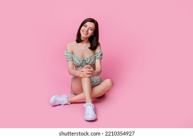 Full Length Photo Of Sweet Cheery Slim Figure Girlfriend Lady Hand Arm Knees Sit Empty Space Isolated On Pink Color Background