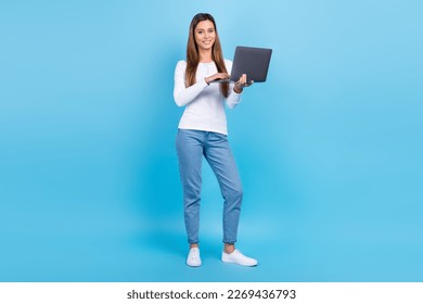 Full length photo of sweet pretty lady dressed white shirt chatting apple samsung device isolated blue color background - Shutterstock ID 2269436793