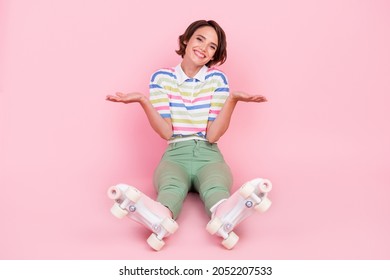 Full Length Photo Of Young Girl Happy Positive Smile Shrug Shoulders Roller Skater Isolated Over Pastel Color Background