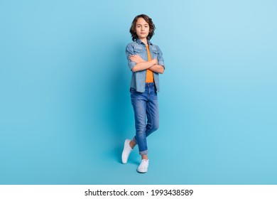 Full Length Photo Of Young School Boy Serious Confident Crossed Hands Isolated Over Blue Color Background