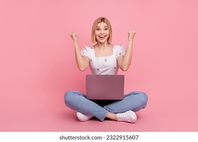 Full length photo of young woman bob hair fists hooray use netbook hp brand celebrate first work day done isolated on pink color background