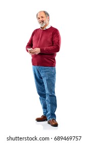 Full Length Portrait Of Active Senior Man Using Cell Phone And Looking At Camera White Background