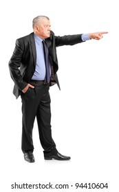 Full Length Portrait Of An Angry Boss Firing An Employee Isolated On White Background