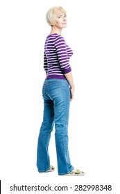 Full Length Portrait Of Attractive Middle Aged Woman Wearing Casual. Back View. Isolated On White.