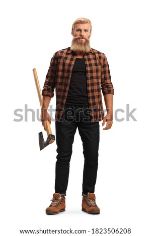 Full length portrait of a bearded guy holding a hatchet isolated on white background