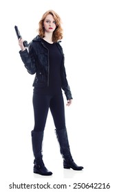 Full length portrait of a beautiful young woman holding a gun. Isolated on white.