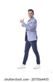 Full length portrait of business man in suit ,tie with hand, thumbs up standing  on white background