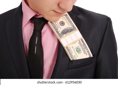 Full length portrait of confident young businessman which face pressed wad of money in formals standing isolated over white background
