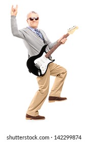 Full length portrait of a cool middle aged man with an electric guitar, isolated on white background