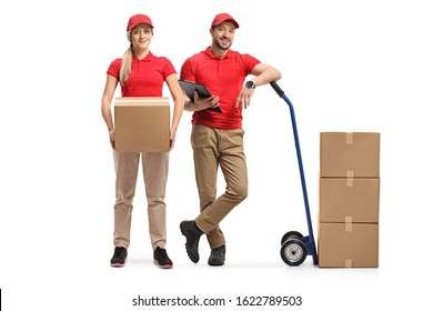 Full length portrait of a delivery man and woman with boxes and a hand truck isolated on white background - Powered by Shutterstock