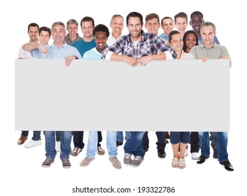 Full Length Portrait Of Diverse People In Casuals Holding Blank Placard Over White Background