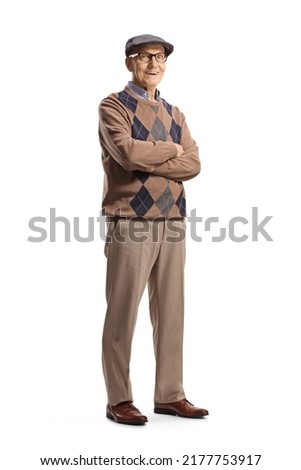 Full length portrait of an elderly man with glasses and hat posing with crossed arms isolated on white background