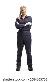 Full Length Portrait Of A Female Worker In An Overall Uniform Isolated On White Background