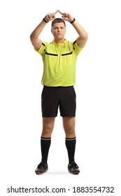 Full length portrait of football referee gesturing a VAR symbol isolated on white background