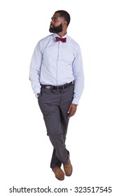 Full Length Portrait Of A Handsome Man Dressed Nicely And Looking To His Right Isolated On White